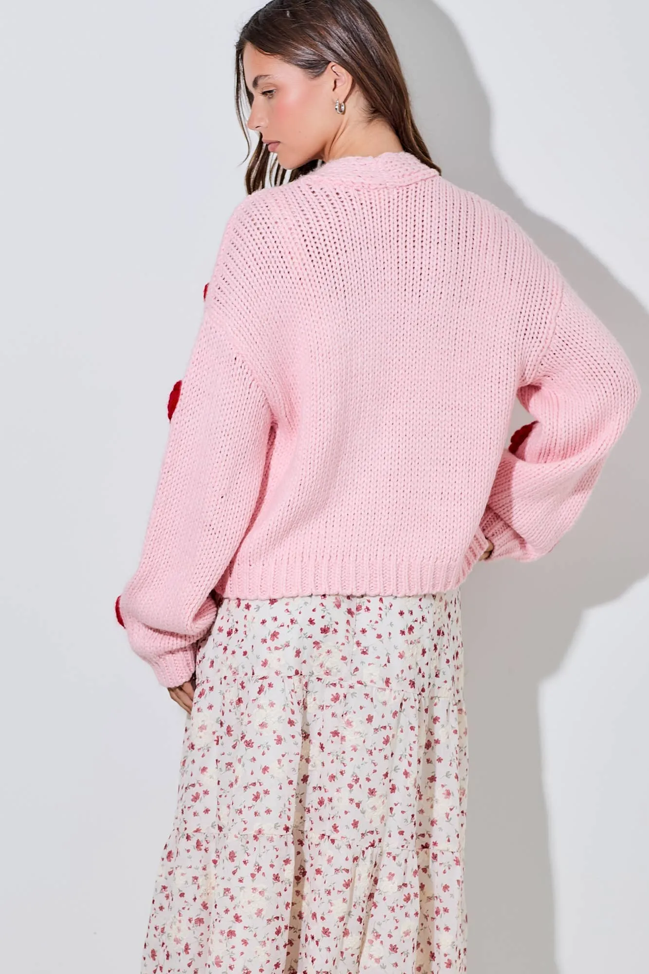 PINK KNITTED CARDIGAN WITH RED BUBBLE HEART DETAIL